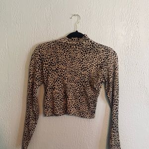 Brandy Melville mocked neck cheetah print top